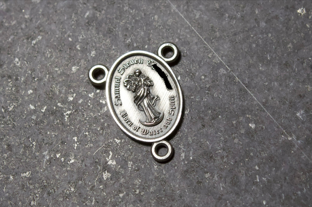 Baptism rosary center in Latin