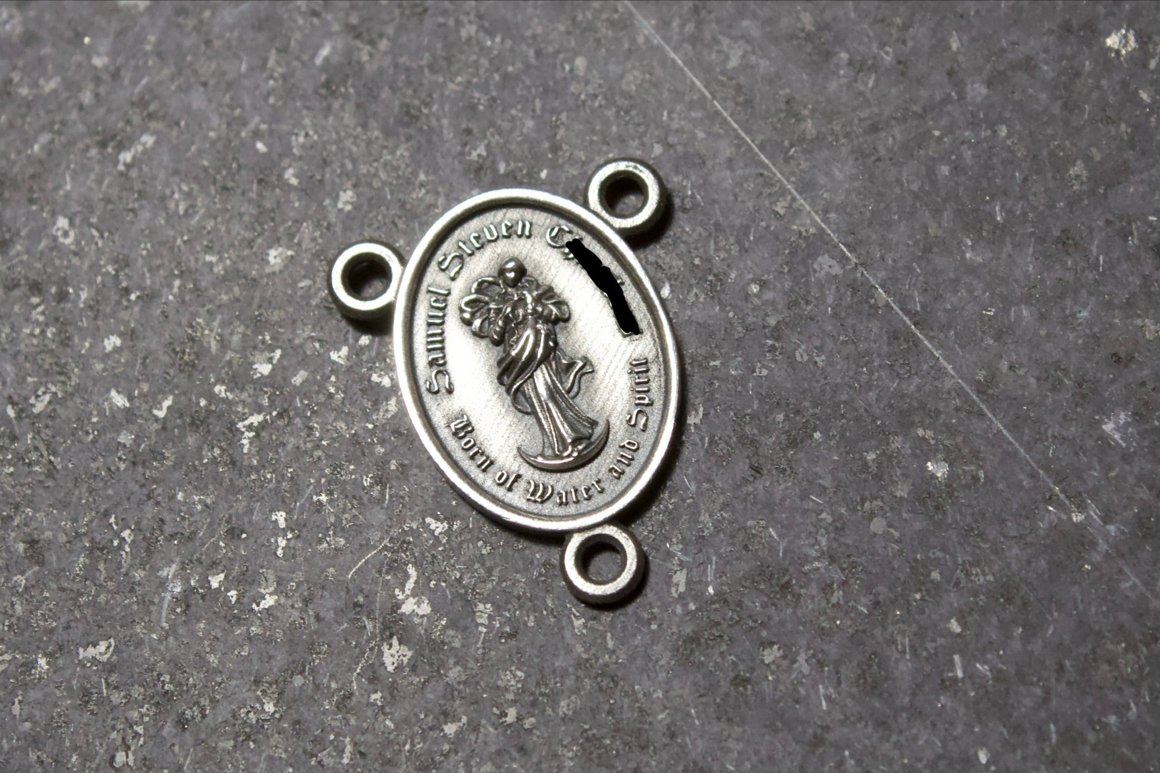 Baptism rosary center in Latin